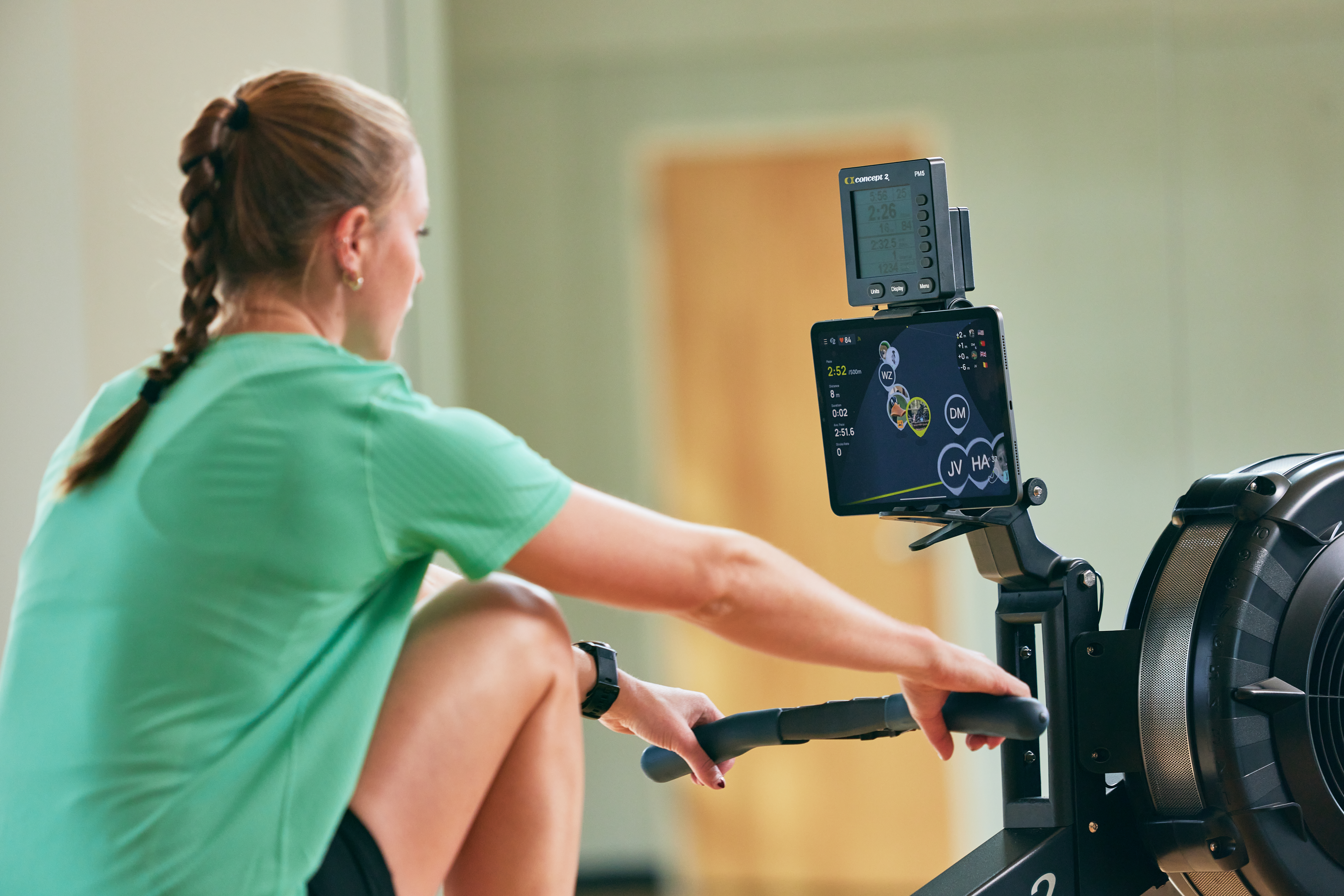 Woman on RowErg with Real Time Loop and ErgData