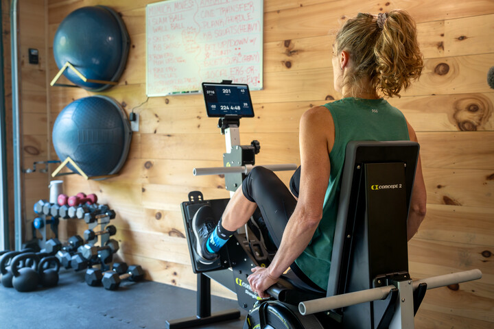 woman using leg press on concept2 strengtherg